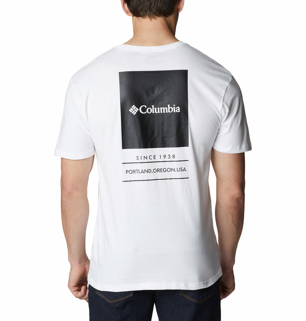 Person wearing a white Columbia t-shirt with branding on the back