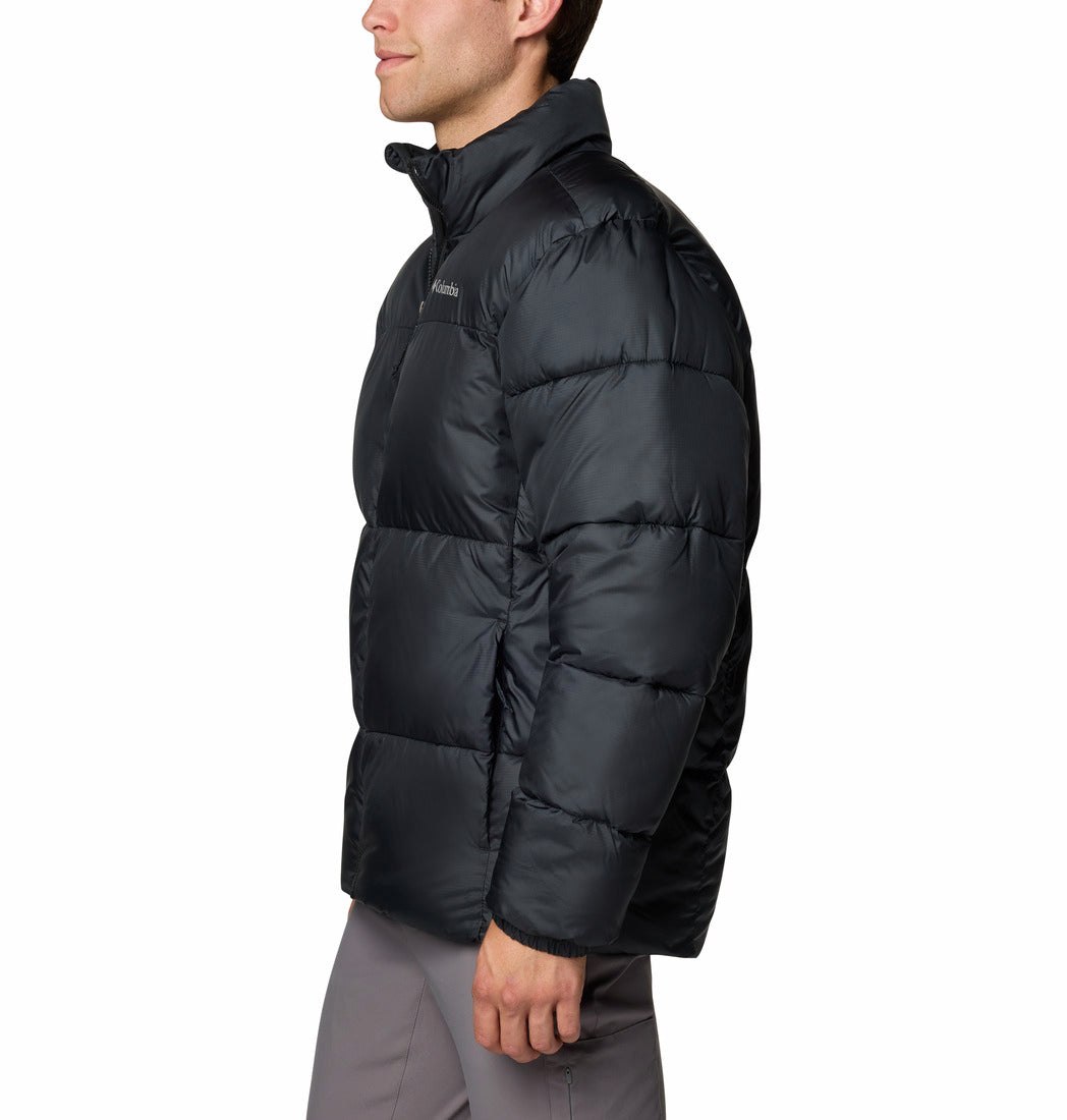 Person wearing a black puffer jacket on a white background