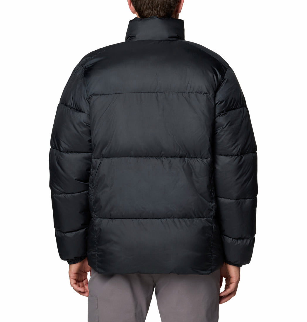 Black puffer jacket worn by a person on a white background