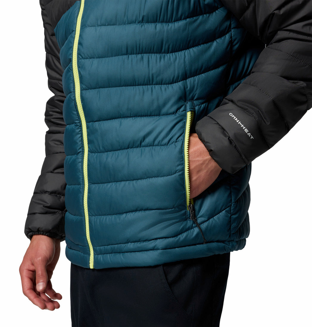 Teal puffer vest with black sleeves and yellow zipper on a white background