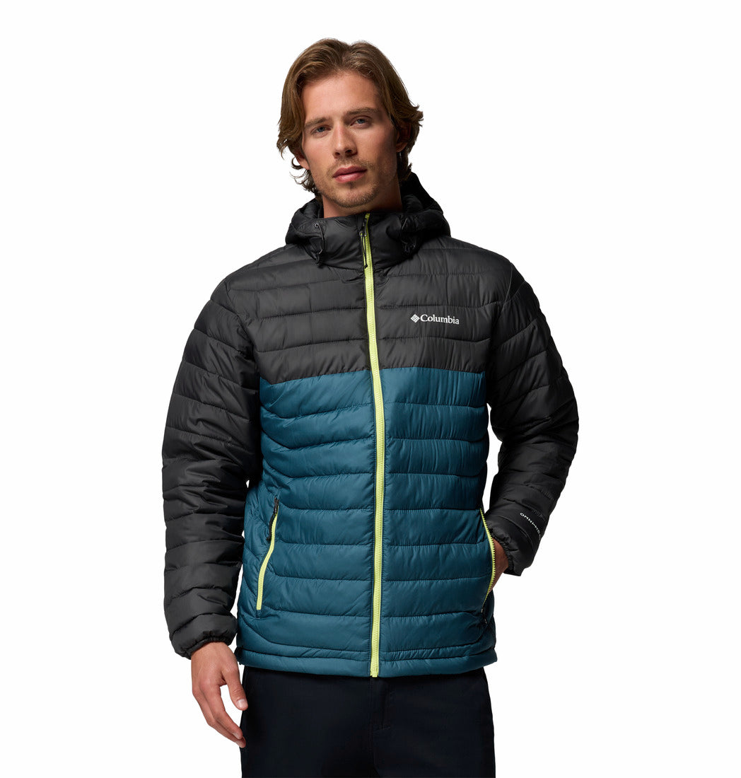 Man wearing a two-tone puffer jacket with Columbia logo on a white background