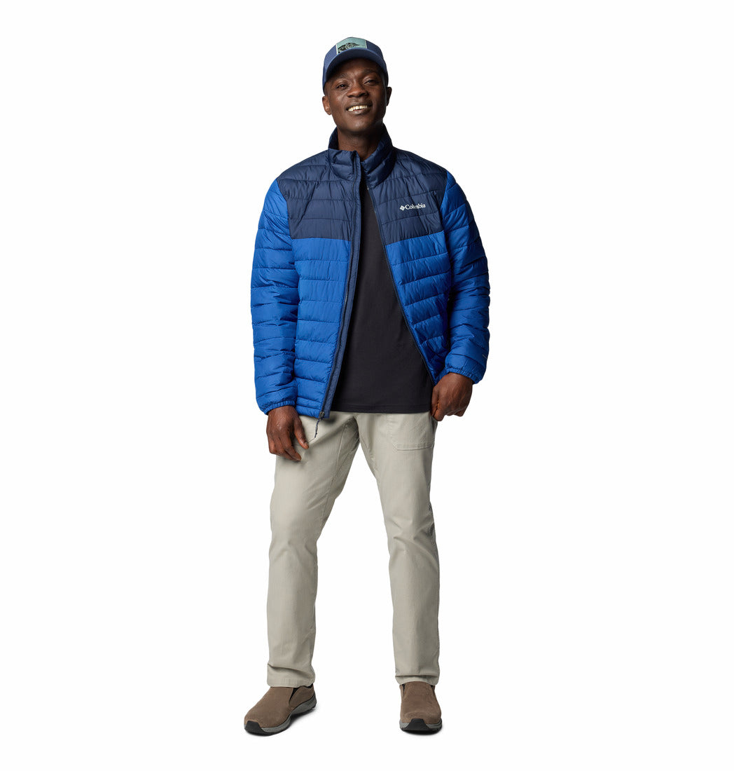 Man wearing a blue and black jacket with Columbia logo on a white background