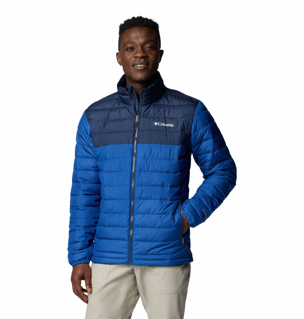 Man wearing a blue Columbia jacket on a white background