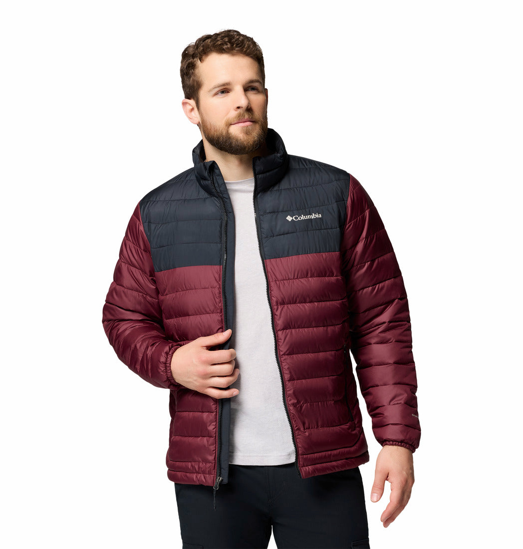 Man wearing a Columbia two-tone puffer jacket on a white background