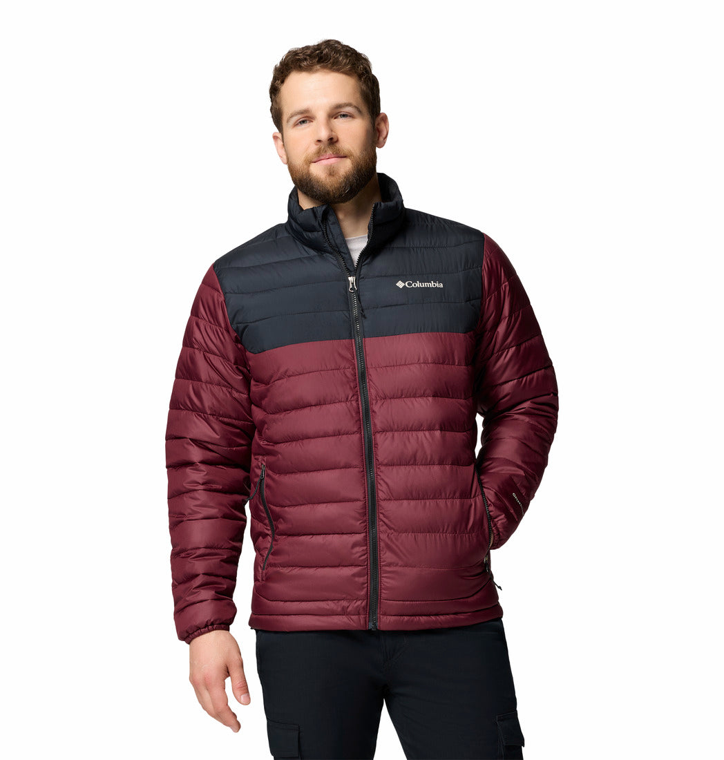 Man wearing a maroon and black puffer jacket with Columbia logo on a white background