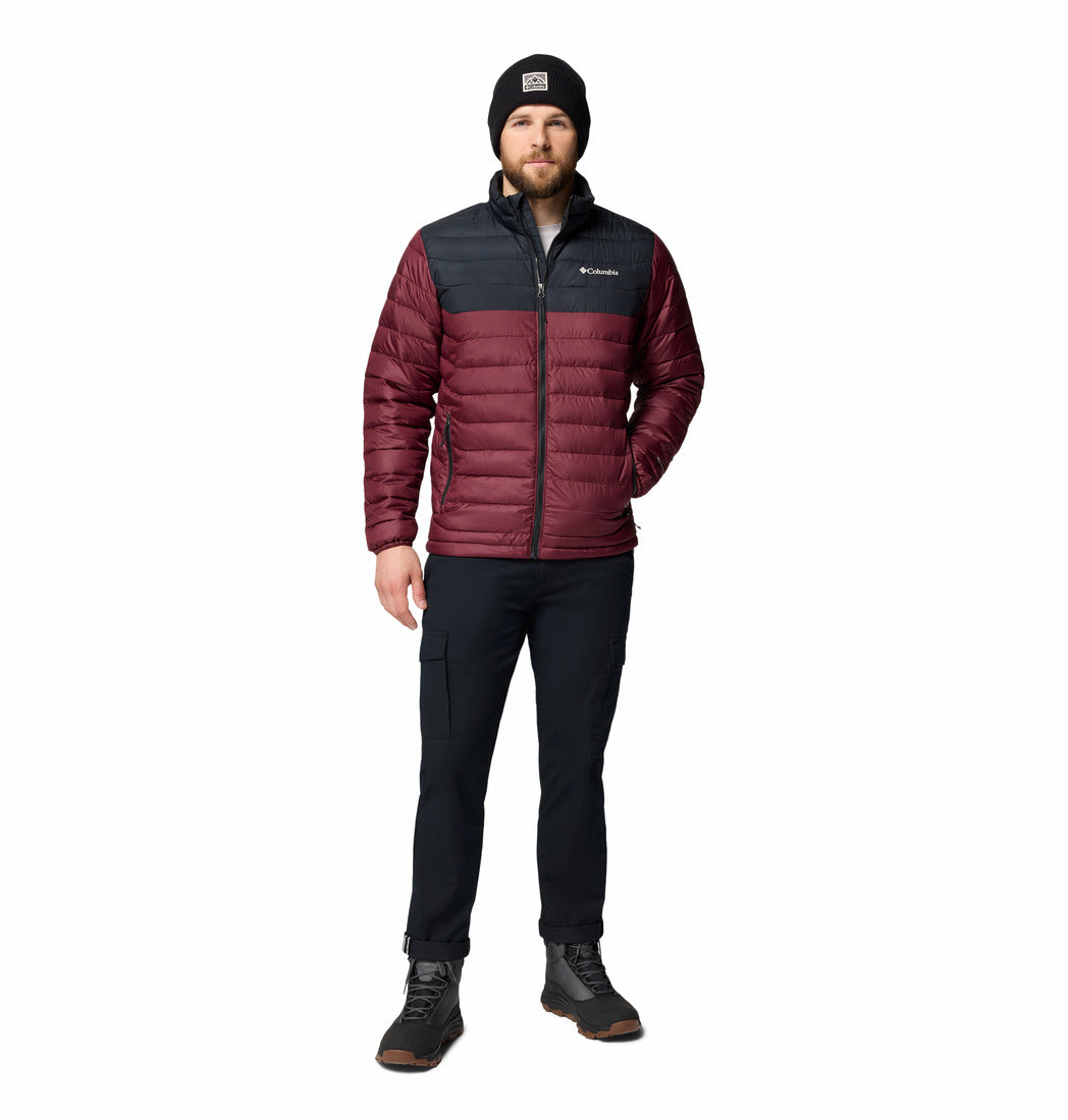 Man wearing a maroon and black jacket with Columbia logo on a white background