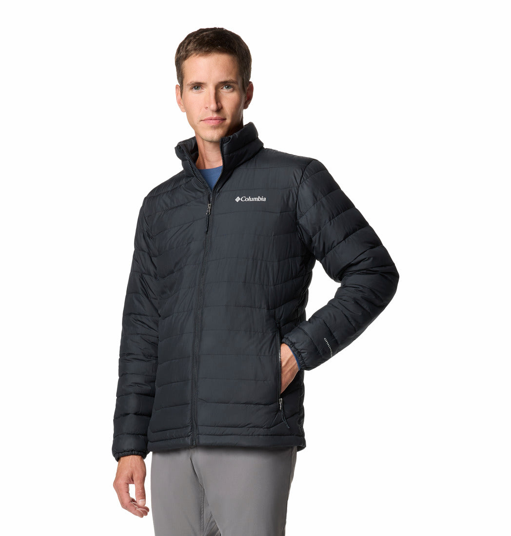 Man wearing a black Columbia jacket on a white background