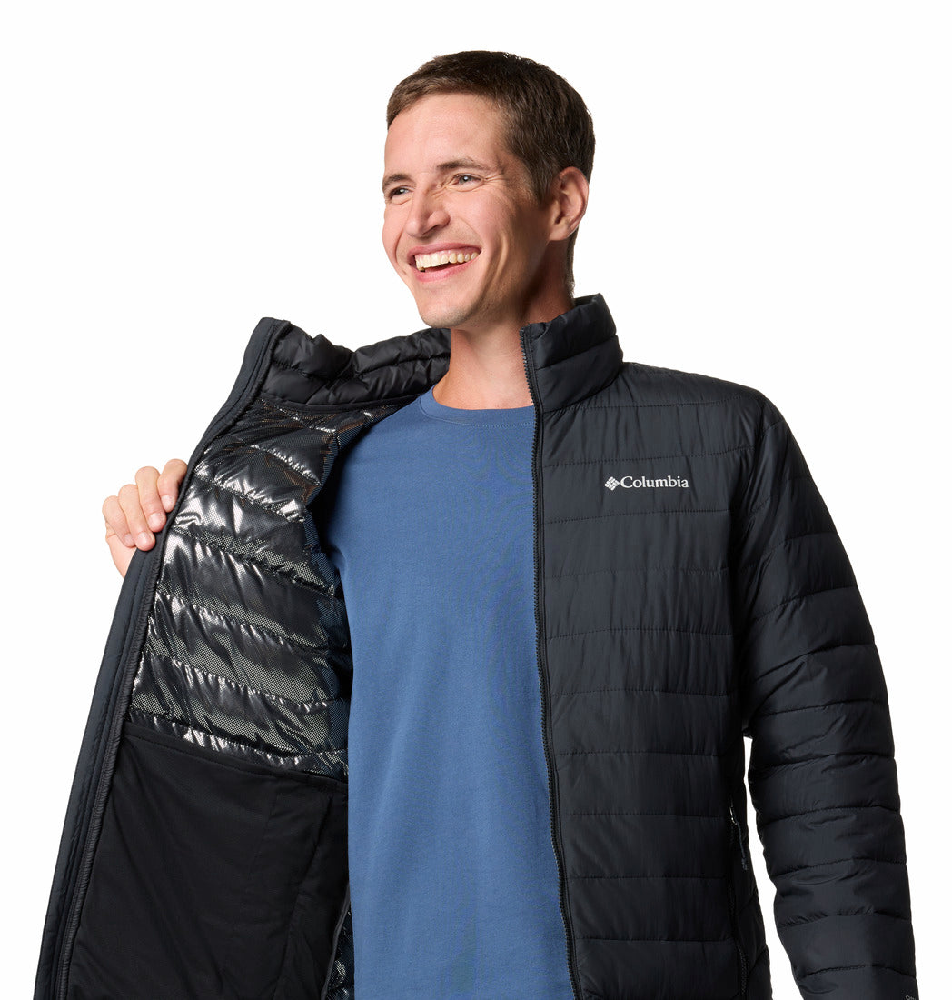 Man wearing a black Columbia jacket on a white background