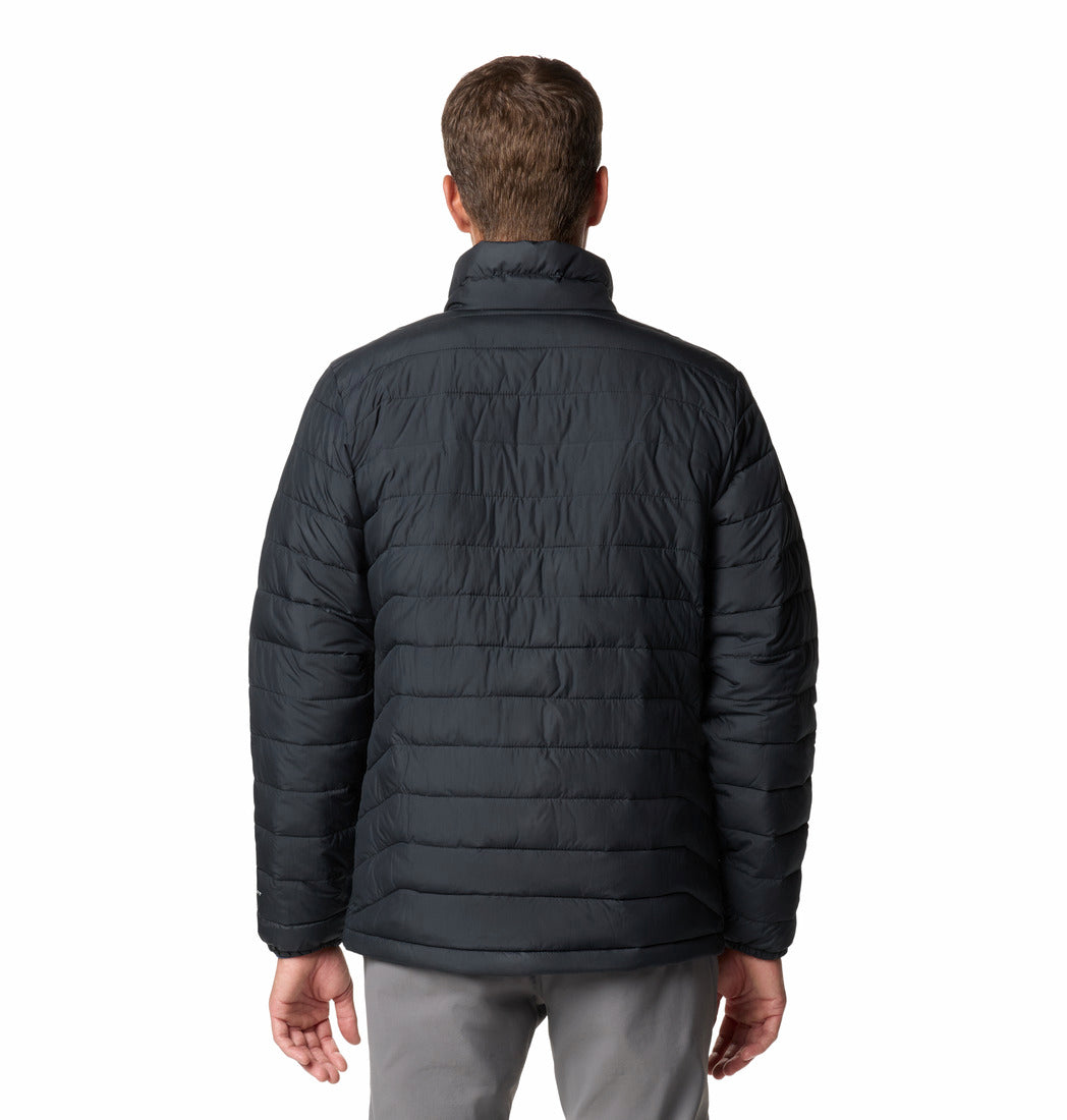 Person wearing a black puffer jacket on a white background