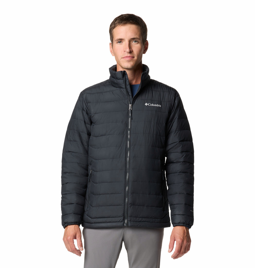Man wearing a black Columbia jacket on a white background