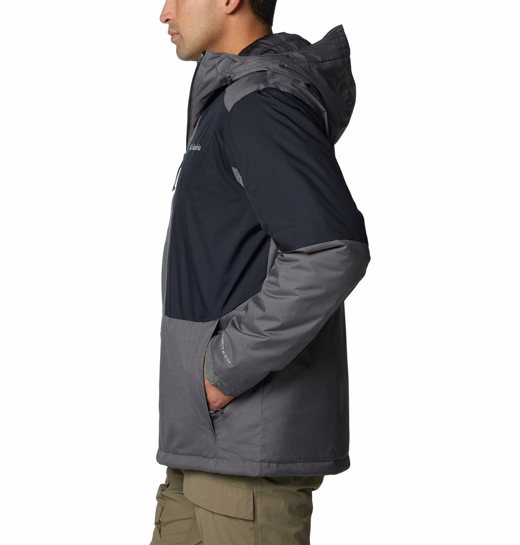 Person wearing a two-tone jacket with dark and light gray colors on a white background