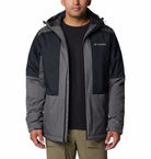 Man wearing a Columbia jacket on a white background
