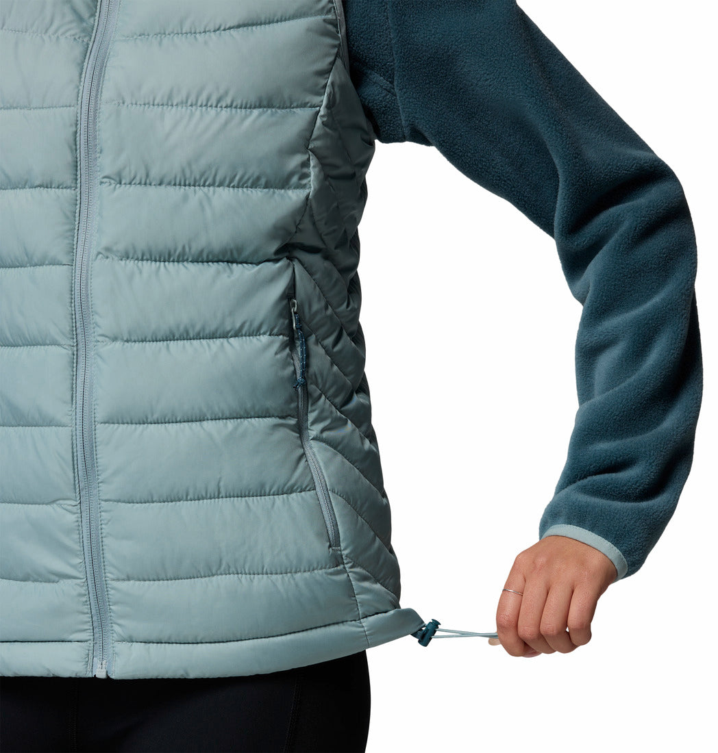Light blue puffer jacket with a person wearing it on a white background