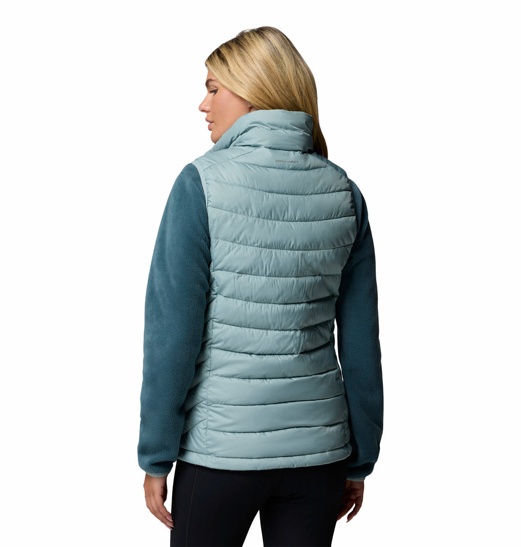 Light blue puffer jacket worn by a person on a white background
