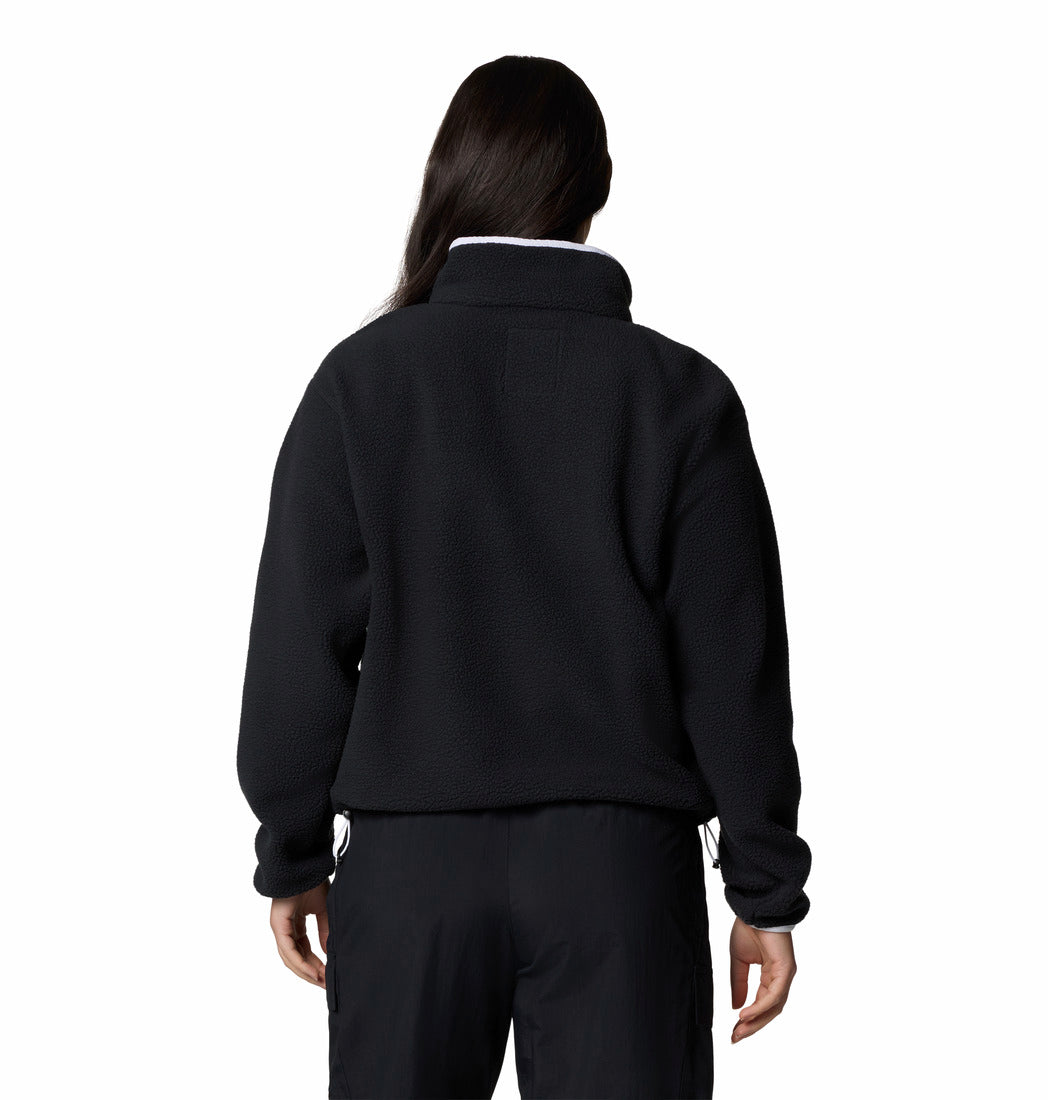 Person wearing a black jacket on a white background