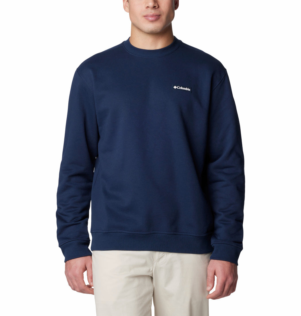 Navy blue sweatshirt with Columbia logo worn by a person on a white background
