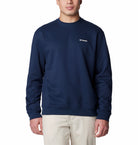Navy blue sweatshirt with Columbia logo worn by a person on a white background