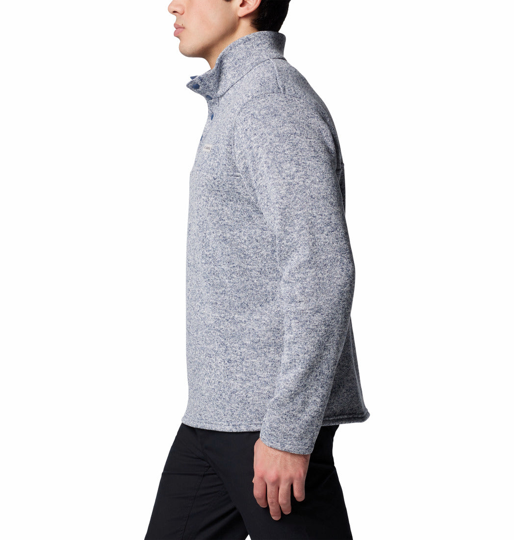 Person wearing a gray fleece jacket on a white background