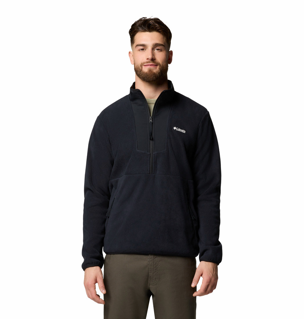 Man wearing a black pullover with Columbia logo on a white background