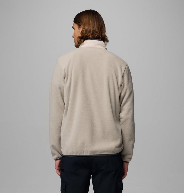 Person wearing a beige fleece jacket on a gray background-Back view