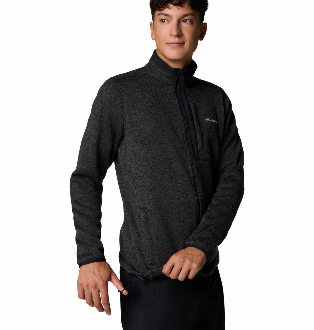 Person wearing a dark gray long-sleeve shirt on a white background