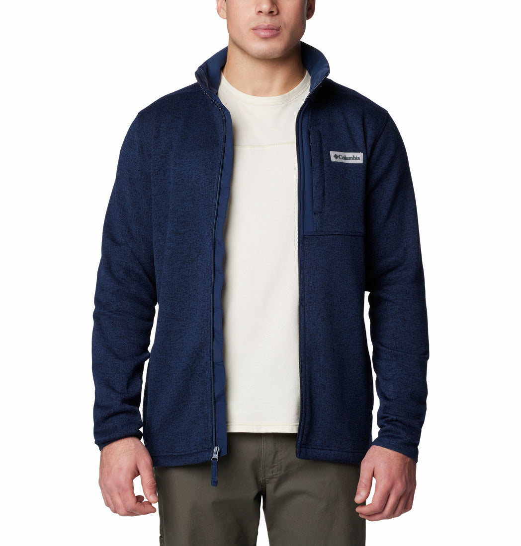 Man wearing a navy blue fleece jacket with Columbia logo on a white background