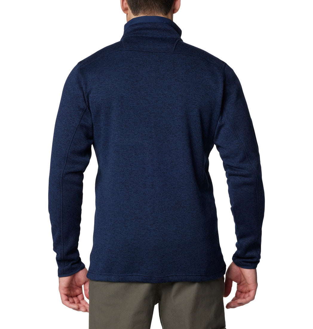 Person wearing a blue fleece with a white background