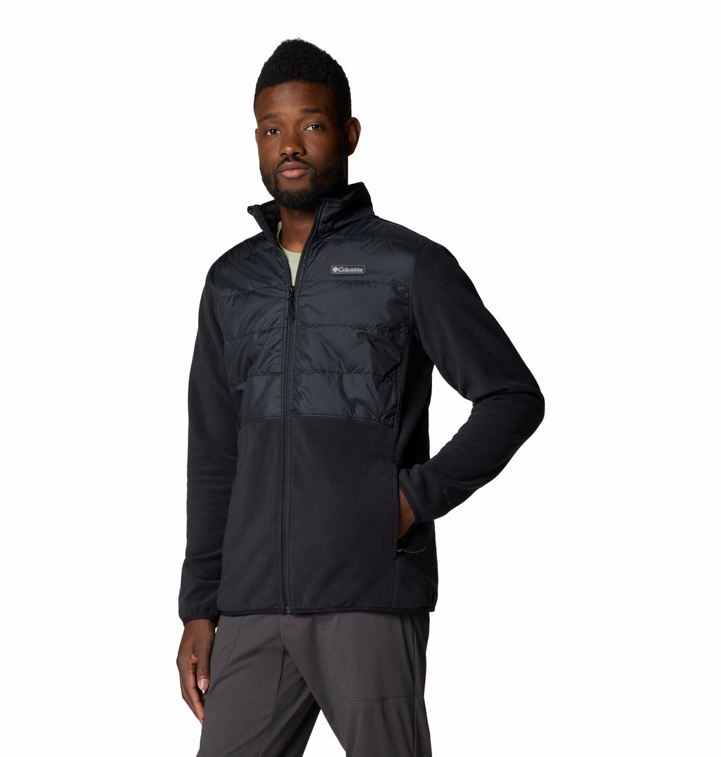 Man wearing a black jacket with Columbia logo on a white background