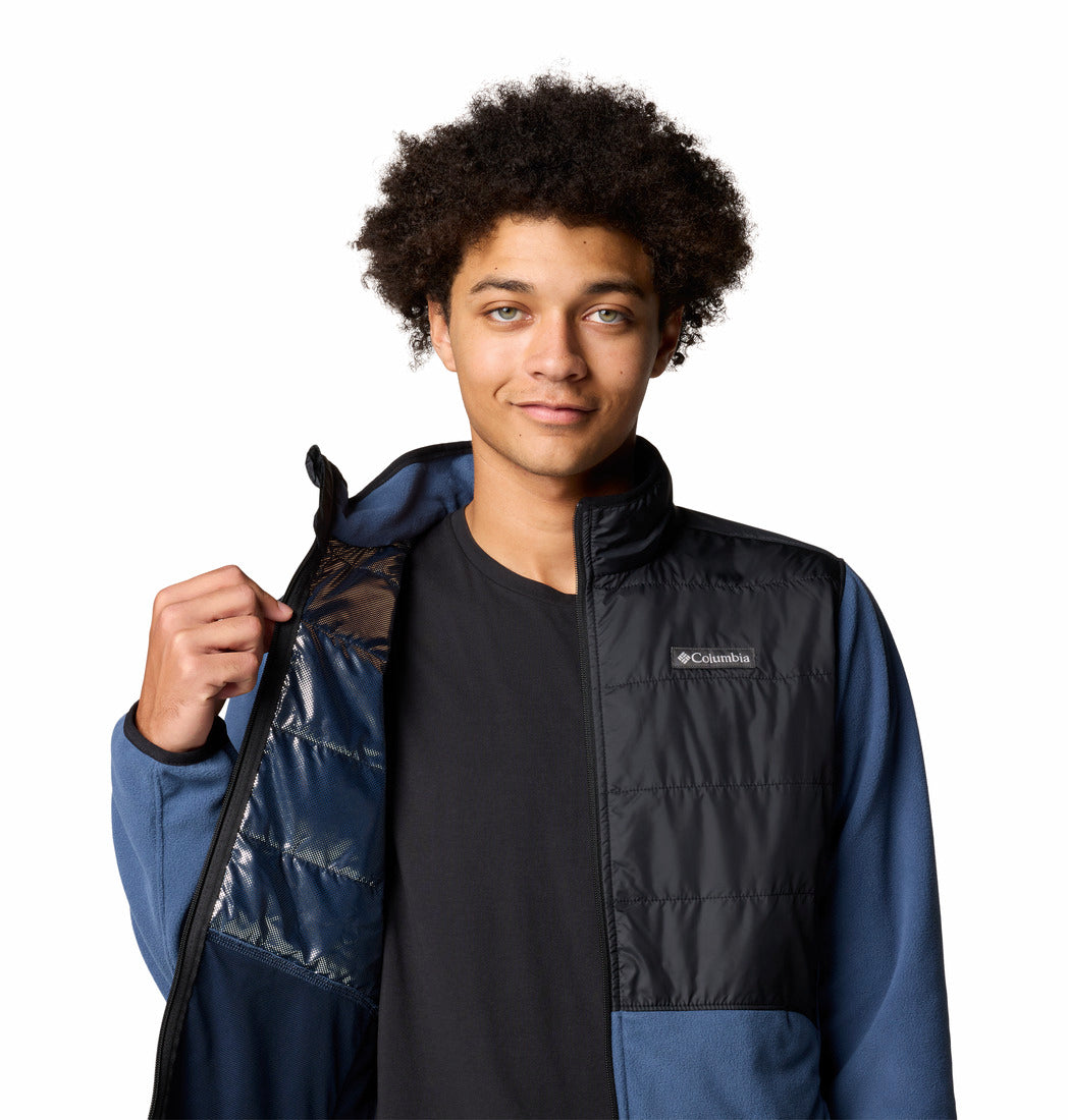 Person wearing a Columbia jacket with a white background