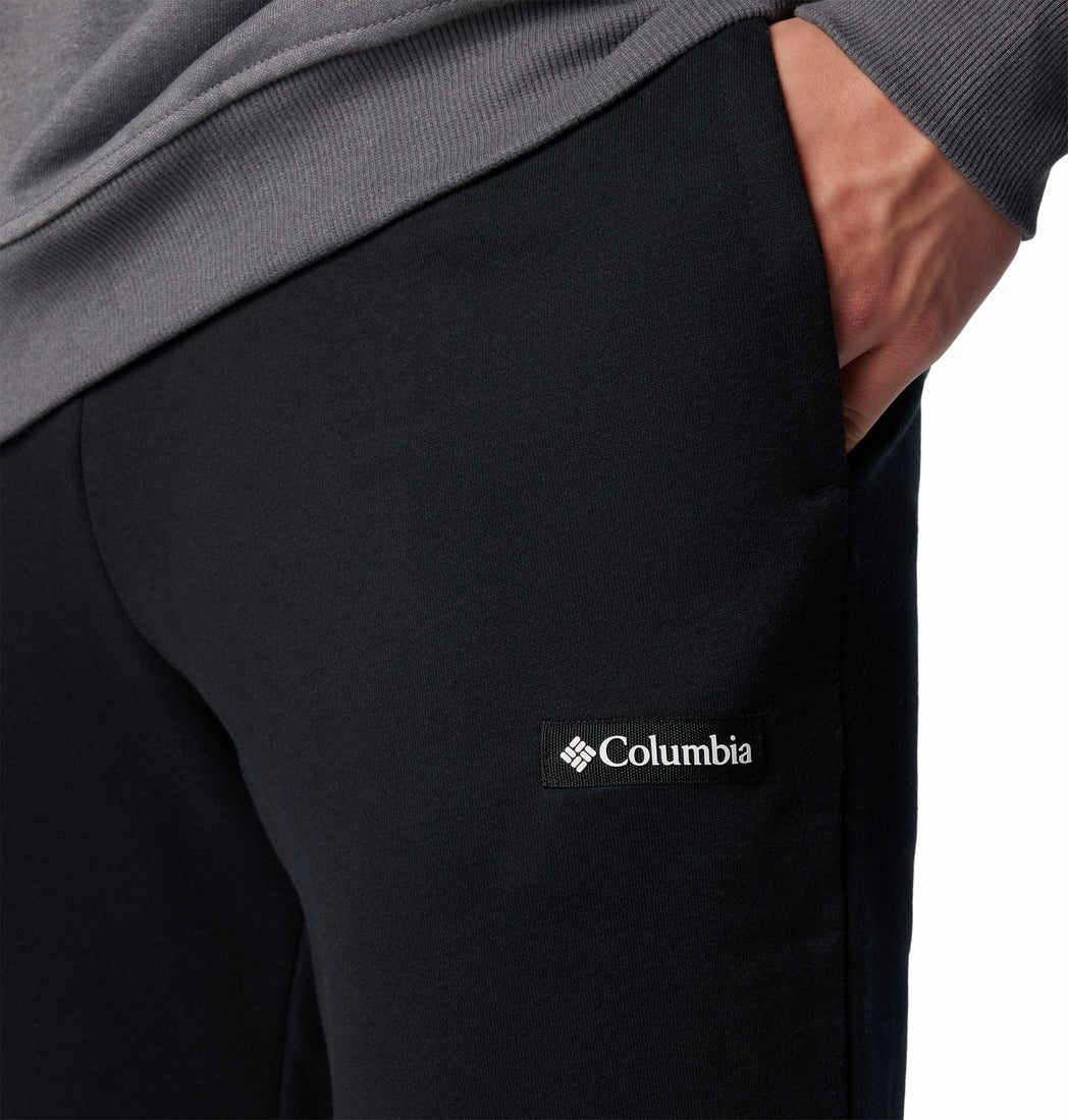 Black Columbia sweatpants with a logo on the leg against a white background
