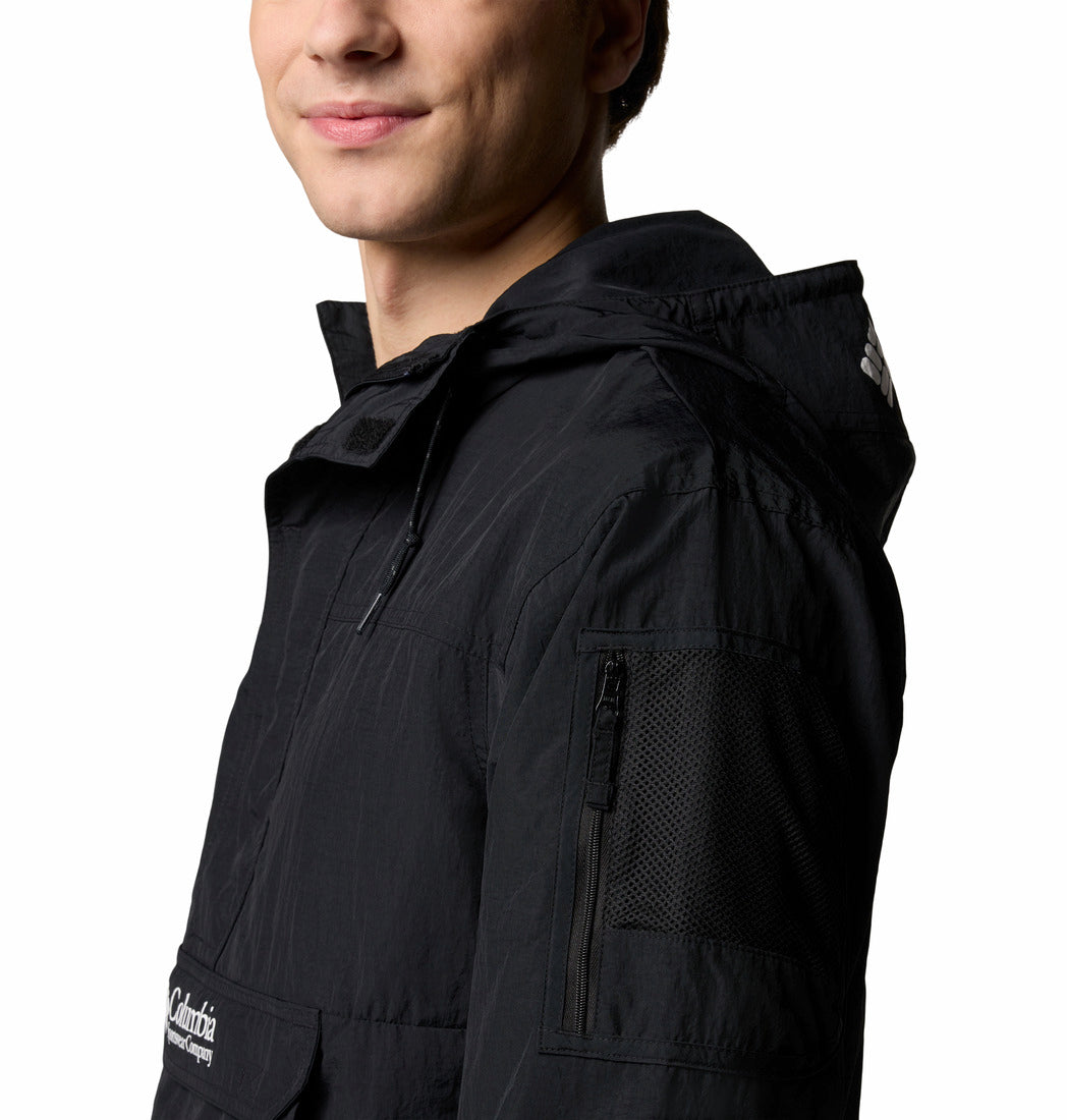 Columbia Mens Challenger Windbreaker Anorak in black, detail view of sleeve zip pocket and mesh panel.