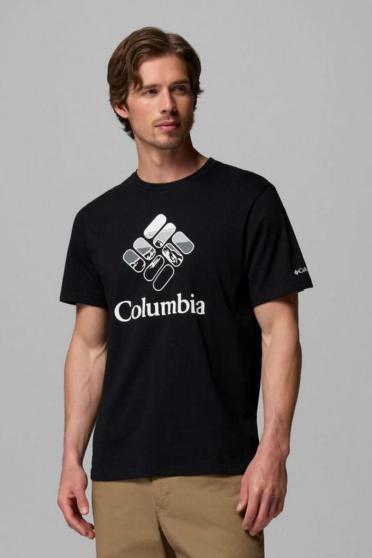 Man wearing a black Columbia t-shirt against a gray background