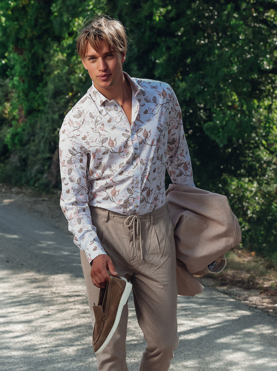 A Fish Named Fred Shirt Birdy Blooms in sand worn by model outdoors