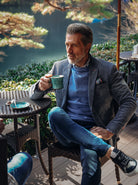 Model wearing the A Fish Named Fred Jeans Blue two-tone rib blazer with a blue jumper and jeans