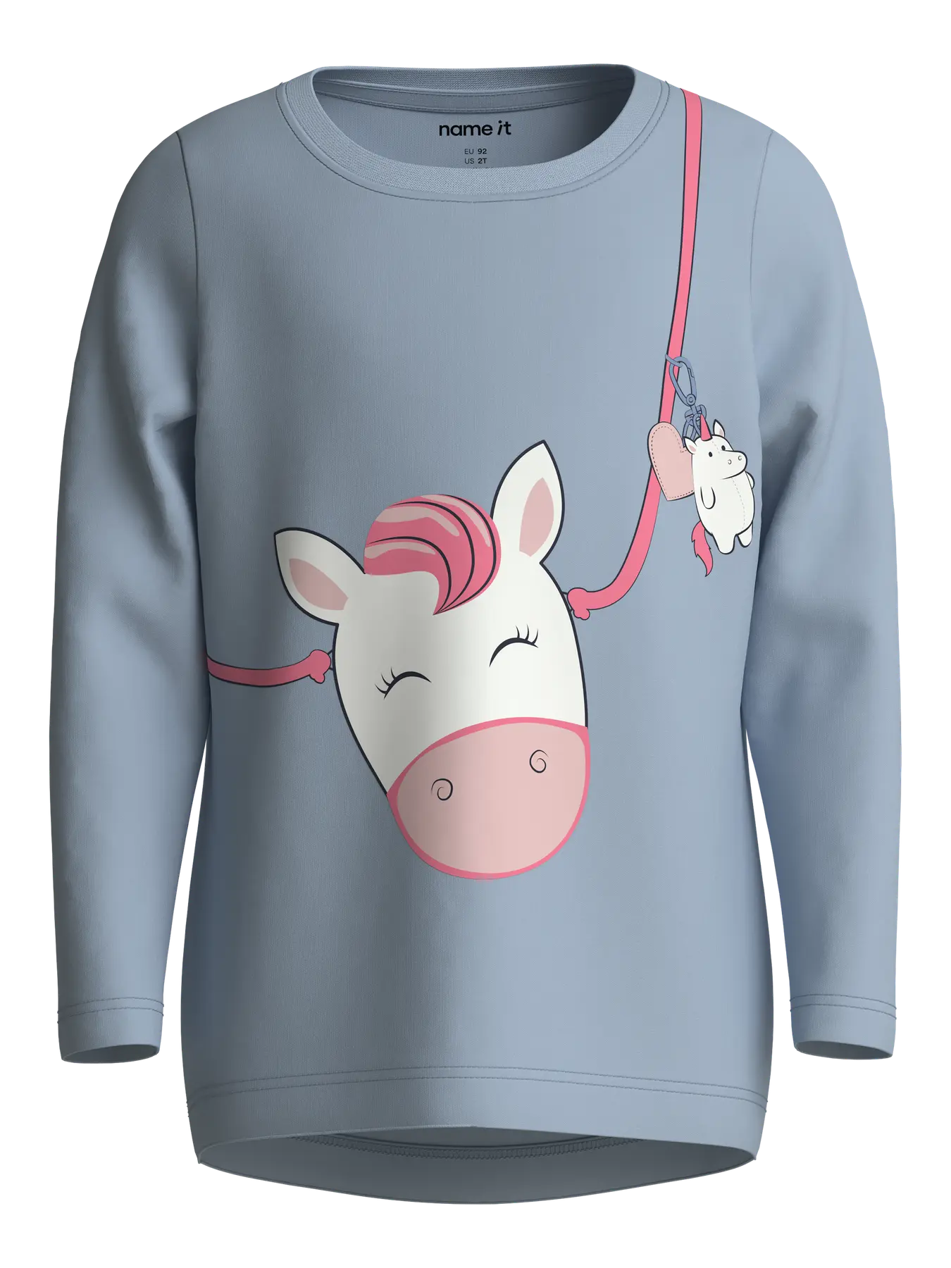 A kids' long-sleeve crewneck sweatshirt in dusty blue, featuring a cartoon graphic of a white horse with pink hair and a pink snout, hanging from a pink strap with a small white dog charm.