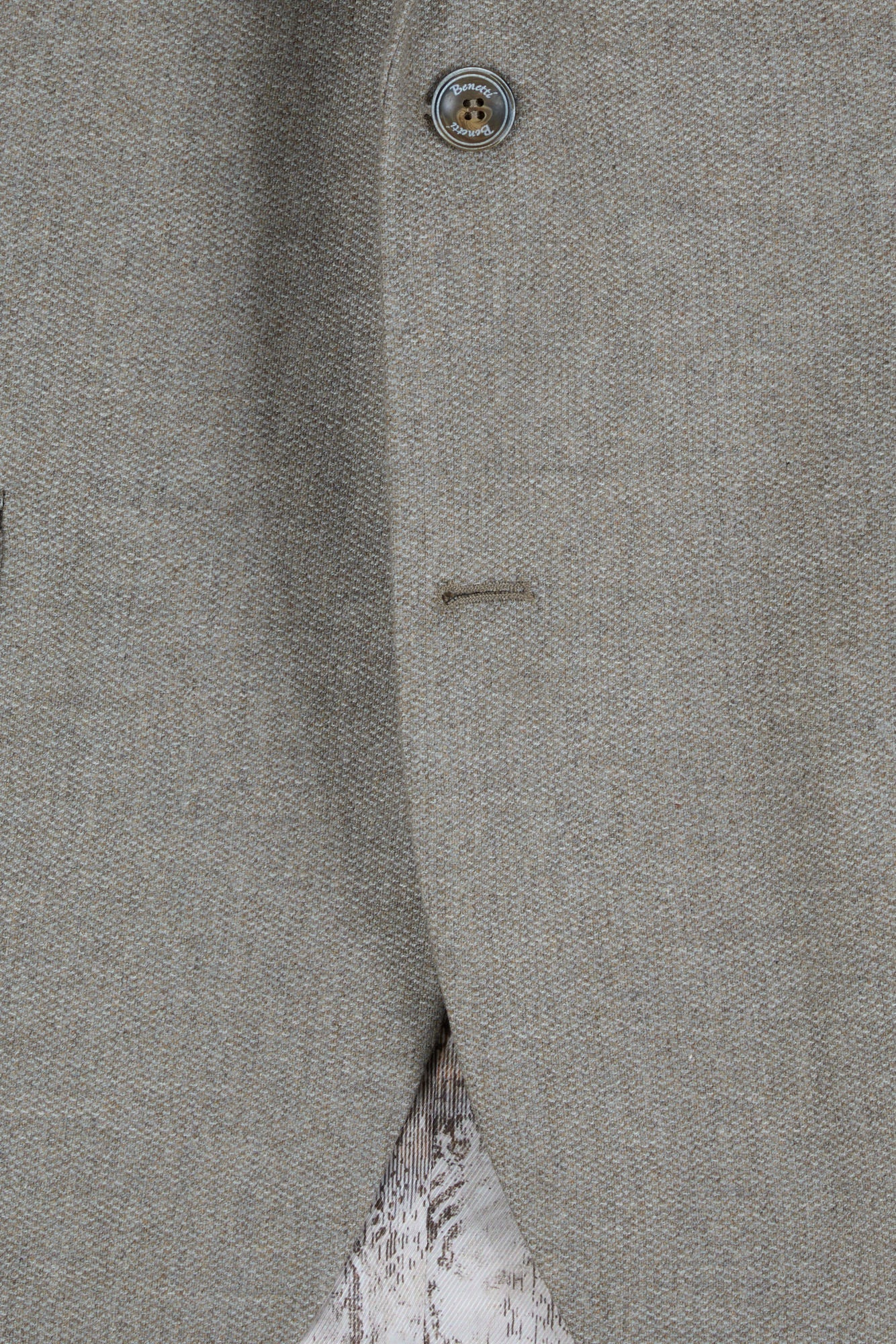 Texture and buttons on the Pisa Stone blazer front closure