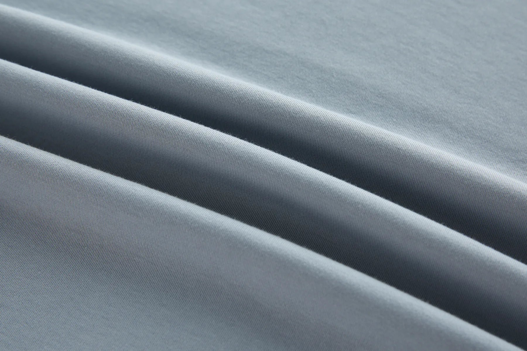Close-up of gray fabric with folds