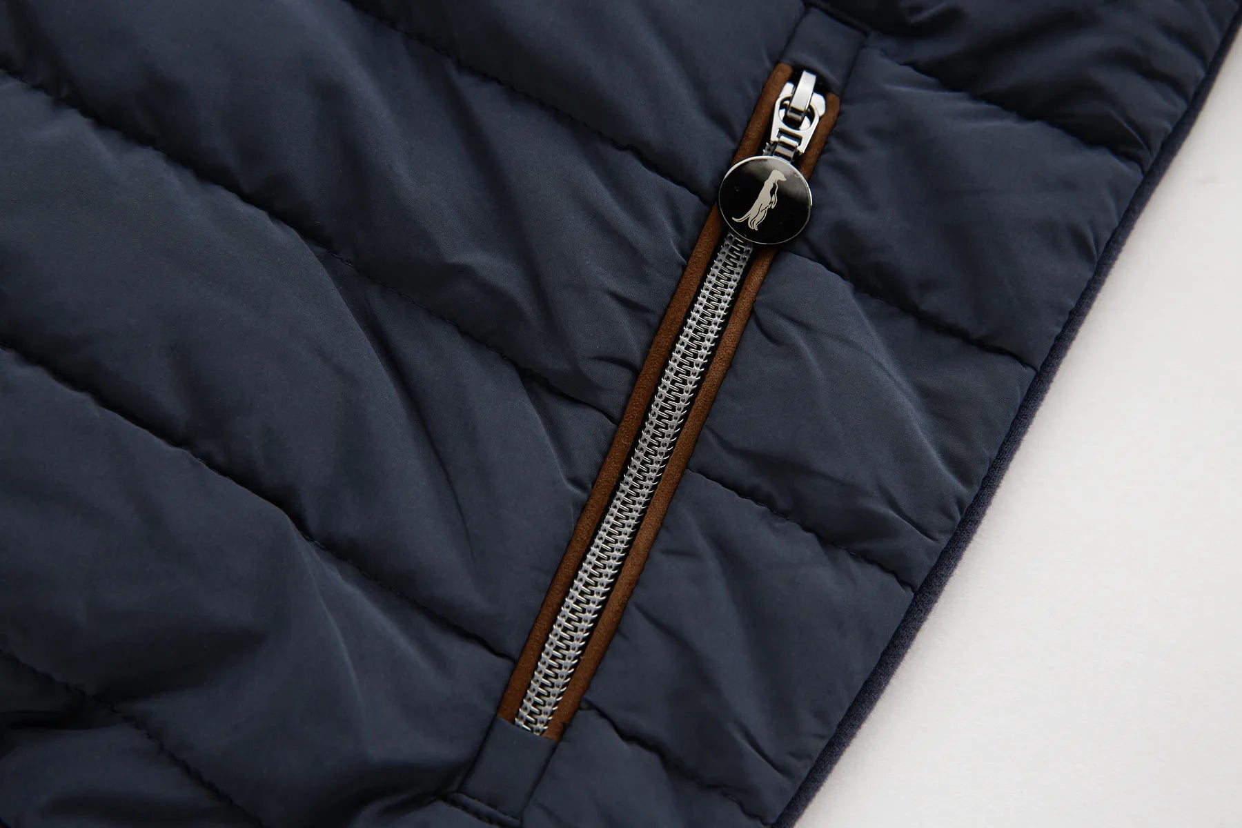 Sammy full zip sapphire navy jacket with a pocket zipper on a light gray background