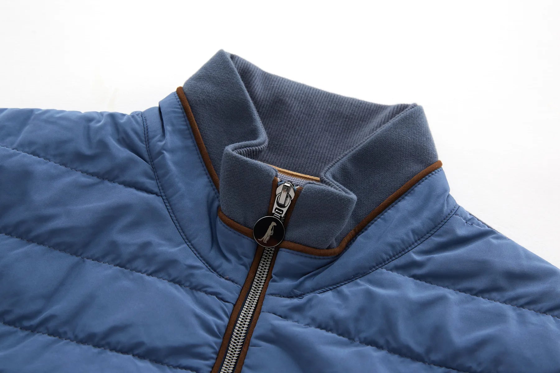 Close-up of Sammy full zip turbulence jacket with a zipper on a white background
