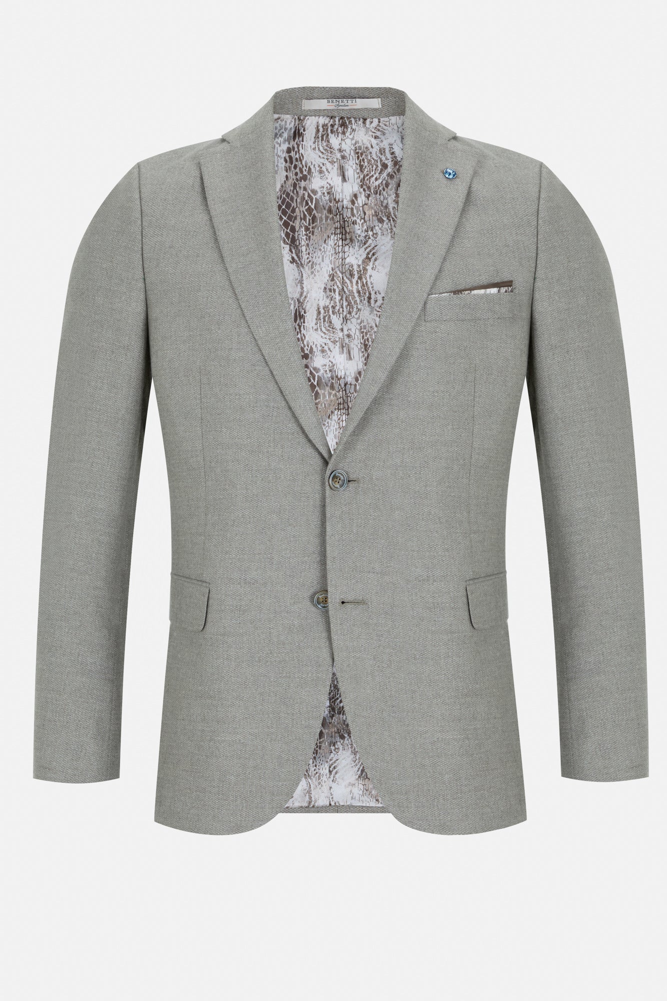 Front view of the Pisa Stone blazer showing the patterned lining and lapel pin