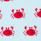 Pattern of red crabs on a light blue background
