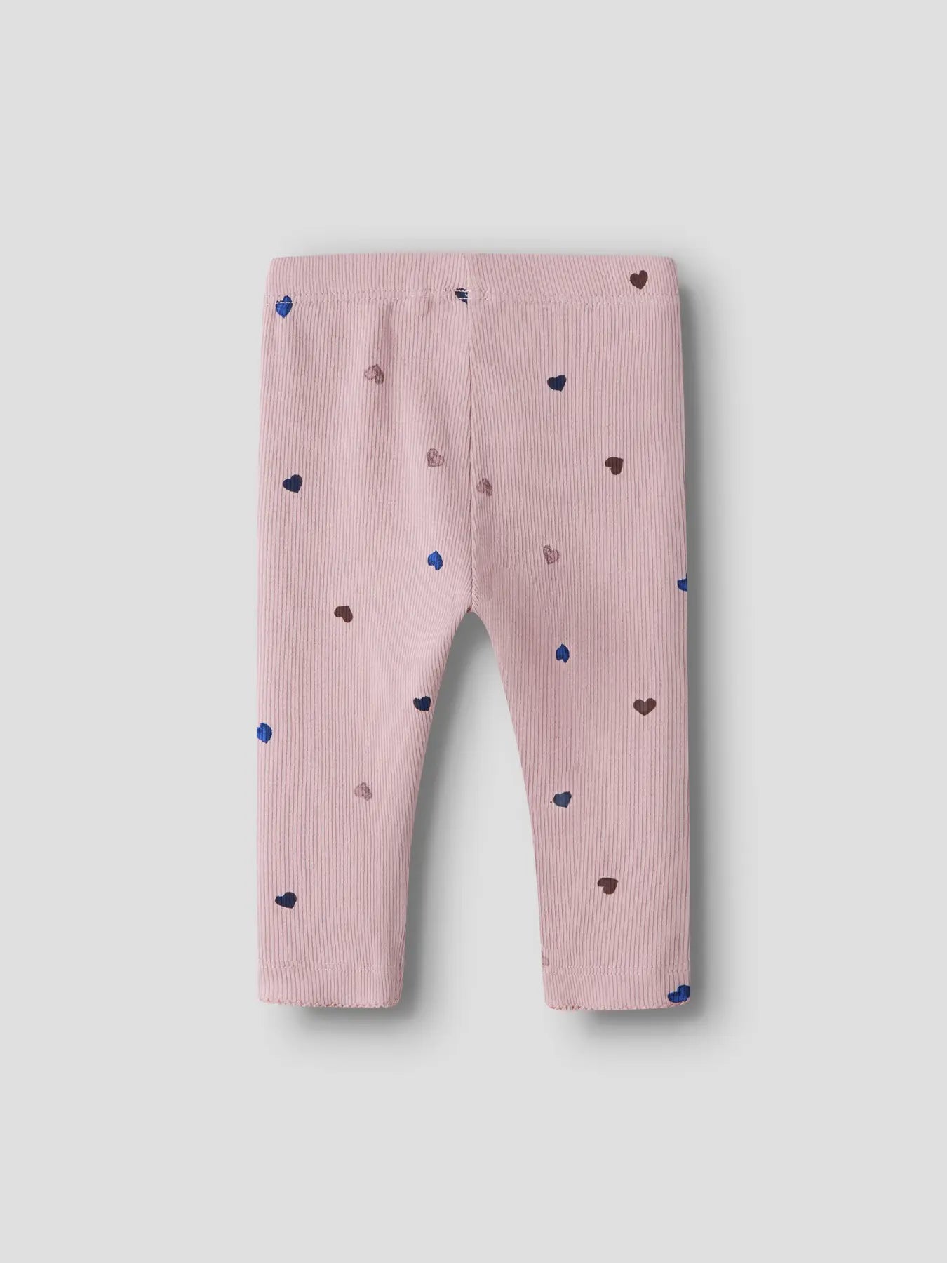 Pink baby leggings with heart patterns on a light gray background