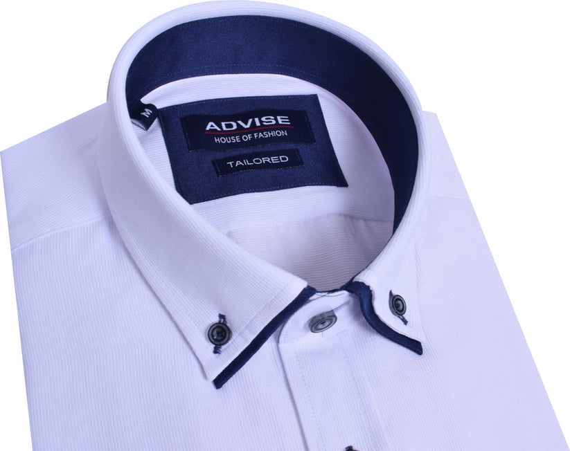 White dress shirt with navy trim and Advise House of Fashion label on a white background
