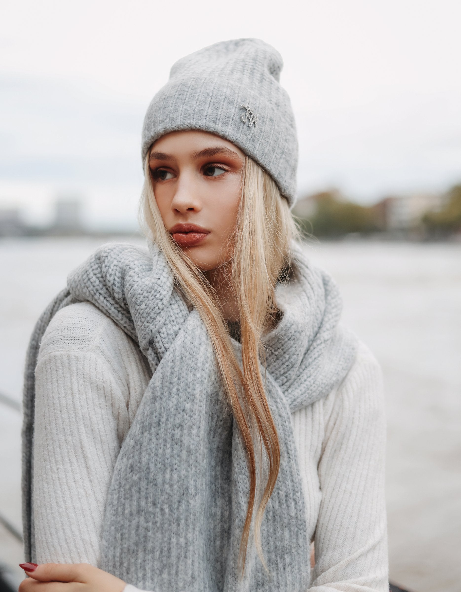 Ladies Grey Knitted Beanie With Small TW Strass Logo-Second Model Front View