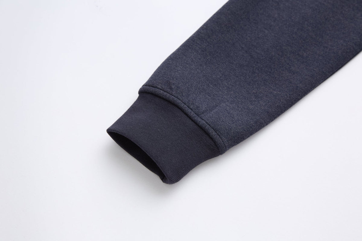 Ribbed cuff on the sleeve of the 6th Sense Air Navy 1/4 Zip Sweat