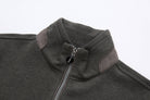 Close-up of the 6th Sense peat sweat's funnel collar with contrast shoulder panels and round logo zip pull.
