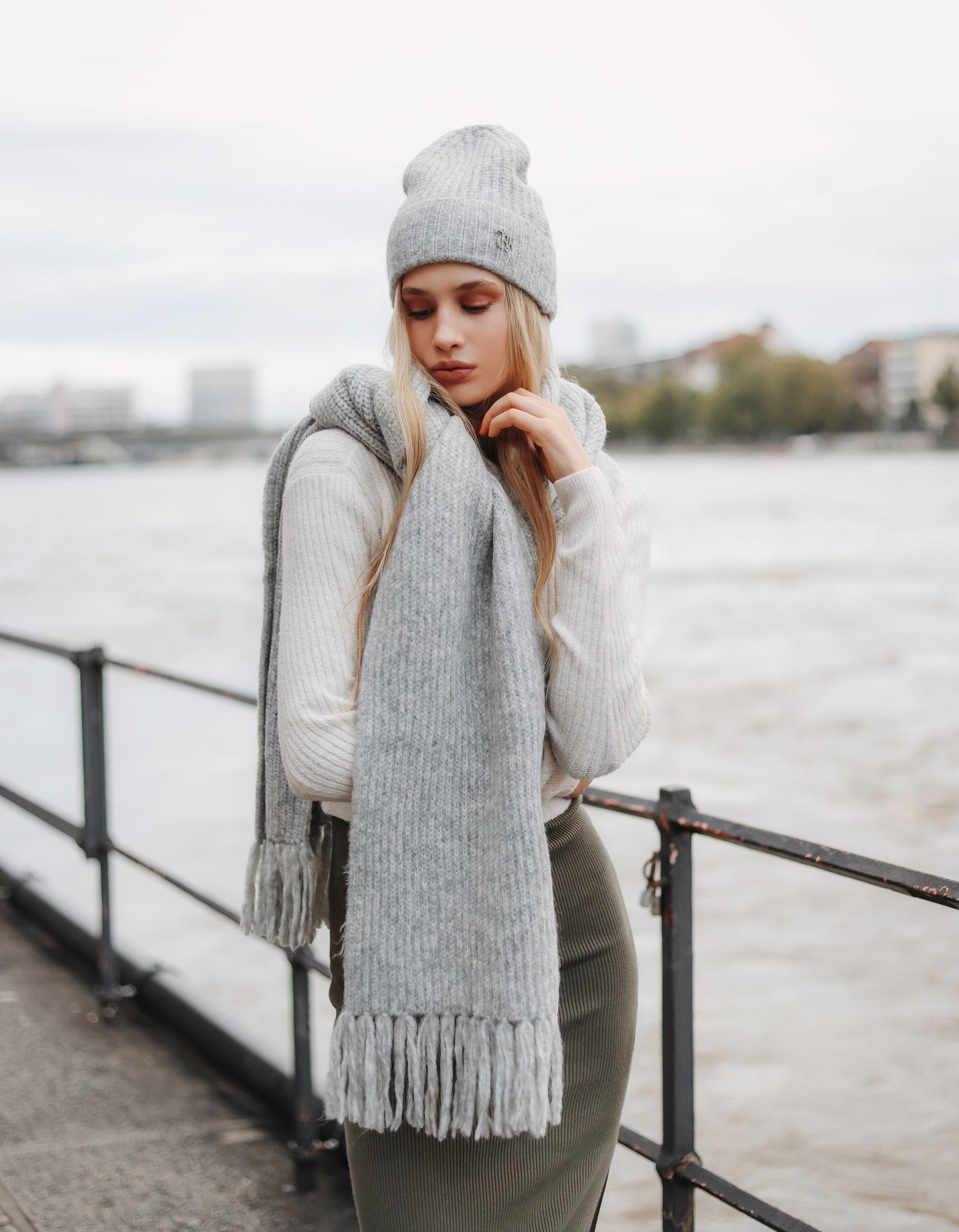 Ladies Grey Knitted Scraf With Fringes-Model Front View