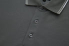 Close-up of the 6th Sense Astound December Polo in December, showing the placket with three buttons and the ribbed collar with white striped tipping.