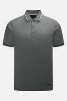 6th Sense Astound December Polo in December, front view. Short-sleeve polo with a three-button placket, ribbed collar and cuffs with white tipping, a 6th Sense label at the inner neck, and a small brand tag at the lower right hem.