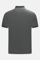 Back view of the 6th Sense Astound December Polo in December, showing a short-sleeved polo with a ribbed collar and sleeve trims, and a thin white stripe along the collar edge.